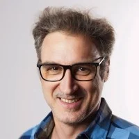 Headshot of the person giving the testimonial